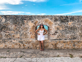 Portrait Of A Beautiful And Happy Latin Woman In The Cartagena City - obrazy, fototapety, plakaty