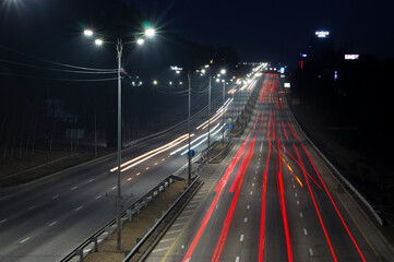 Fototapeta na wymiar 02.24.2021 Kazakhstan, Almaty. Night city car traffic on long exposure