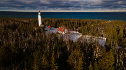 New Presque Isle Lighthouse in Michigan during the winter.