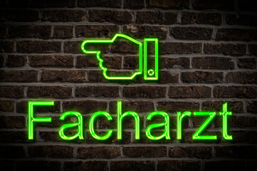 Obraz premium Leuchtreklame Facharzt