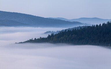 autumn fog in a mountain valley