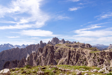 Fototapeta na wymiar Mountain peaks of the Italian Dolomites and beautiful blue sky. South Tyrol, Italy