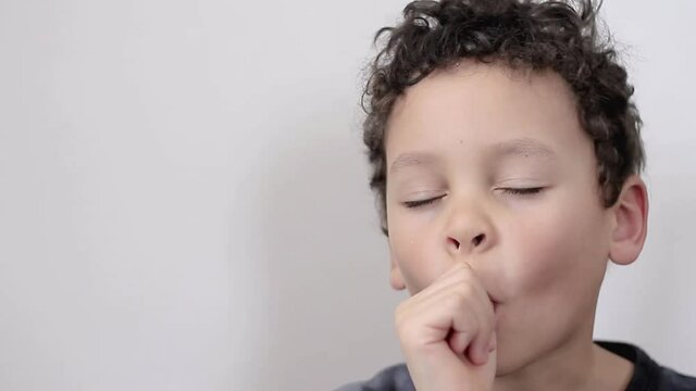 boy sucking thumb on white background stock video