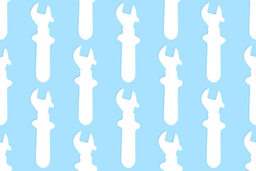 Adjustable wrench seamless pattern. Background from a metal adjustable wrench.