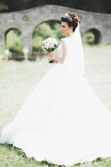 Portrait of a beautiful fashion bride, sweet and sensual. Wedding make up and hair