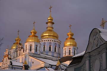 Fototapeta na wymiar Golden domes of St. Michaels Cathedral in Kiev against the sky