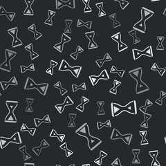 Grey Sauna hourglass icon isolated seamless pattern on black background. Sauna timer. Vector.