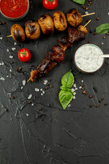 Kebap, roasted meat and vegetables on grill