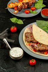 Kebap wrapped in a very thin pita or lavash 