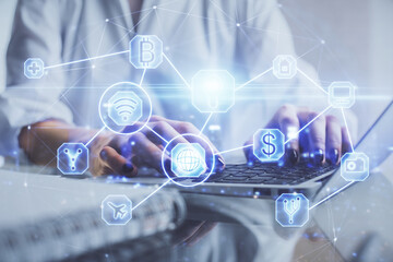 Double exposure of woman hands typing on computer and social network theme hologram drawing. People media concept.