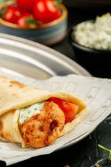 Kebap wrapped in a very thin pita or lavash 