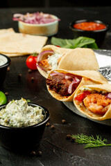 Kebap wrapped in a very thin pita or lavash 