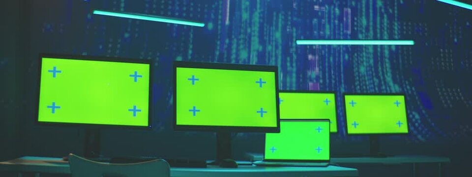Hi-tech office with a greenscreen computer displays and modern background animaton.
