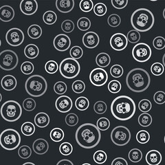 Grey Mexican skull coin icon isolated seamless pattern on black background. Vector.