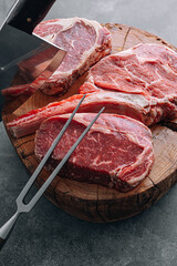 Fresh raw Prime Black Angus beef steaks. Variety of raw beef meat steaks for grilling.