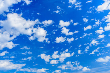 White fluffy clouds in the blue sky