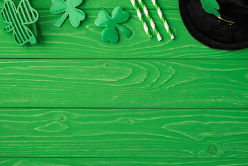 Top above overhead close up view photo picture of leprechaun black headwear drink straws clover...