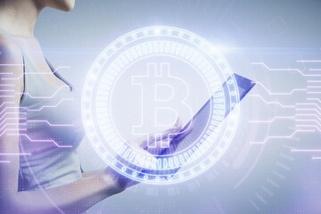 Double exposure of blockchain business sketch hologram and woman holding and using a mobile device.