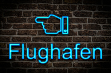 Fototapeta premium Leuchtreklame Flughafen