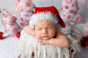 first photo session. newborn child. child in in a New Year's image. first pictures of newborn new year