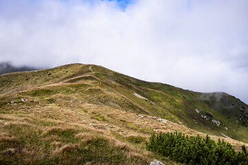 landscape in the mountains with clouds