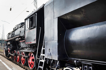 The locomotive of the last century standing under steam