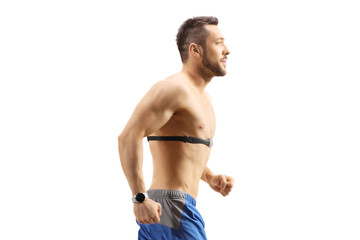 Fit guy exercising and wearing a chest strap monitor
