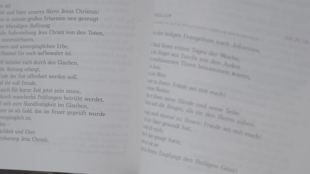 Close-up of a german evangeliary, focus moves from one page to the other