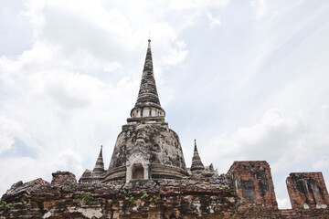 Fototapeta premium AYUTTHAYA, THAILAND - MAY 25, 2018: Ayutthaya Historical Park in Ayutthaya (second capital of the Siamese Kingdom). A very popular destination for day trips from Bangkok. Wat Phrasisanpetch Temple. 