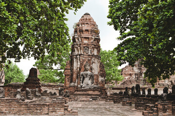 AYUTTHAYA, THAILAND - MAY 25, 2018: Ayutthaya Historical Park in Ayutthaya (second capital of the Siamese Kingdom). A very popular destination for day trips from Bangkok. Wat Mahathat Temple.