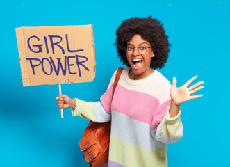young pretty afro woman girl power concept