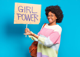 young pretty afro woman girl power concept