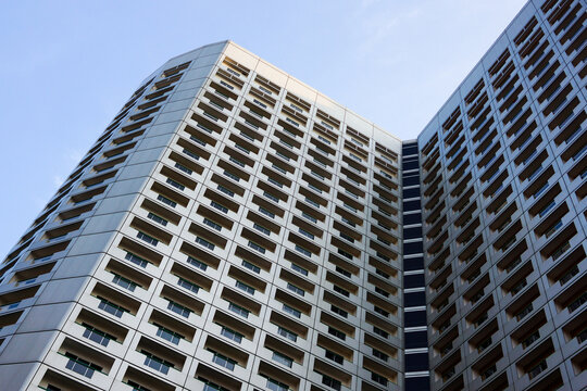 View From Below Raffles City Singapore Complex Building. Popular Tourist Destination. Clear Blue Sky. No People.