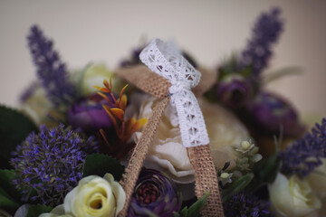 Colorful flower, rose, carnation beautiful bouquet. Artificial flowers. Decorative flowers. Decor for home. Closeup. Selective focus.