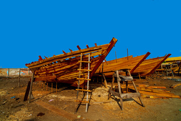 Wooden boat making.
Wooden boats are made for local fishermen to catch the fish in low water plus their travelling to near by areas, These boats are very economical for them.