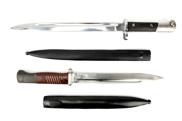 Two modifications of bayonet knives for the Mauser rifle. The scabbards are next to the blades.