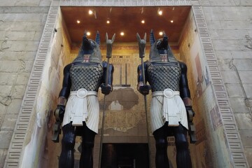 Low angle view of giant and tall replica of Egyptian god statue of Anubis
