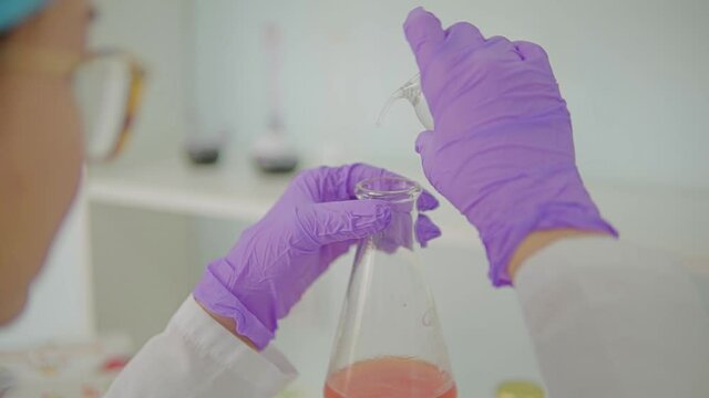 laboratory assistant,test tube.aplle juise test