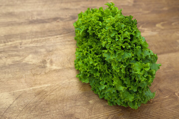 Obraz na płótnie Canvas green salad leaves vegetarianism and proper nutrition