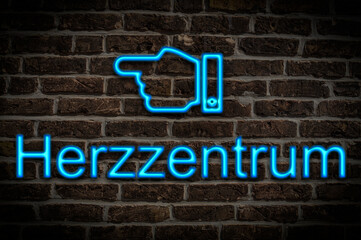 Fototapeta premium Leuchtreklame Herzzentrum