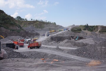 Mining operation activity at quarry in Central Java, Indonesia. Volcanic materials and rocks from Mount Merapi eruption 2010. Example of the danger of natural disaster. Popular tourist destination. 