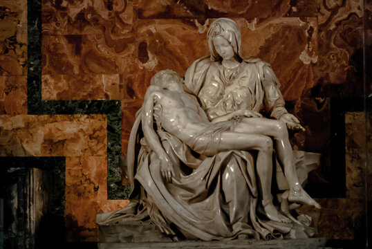 statue of Jesus christ on Mary's arms