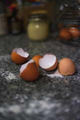 detail photograph of broken eggshells in the kitchen