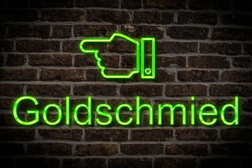 Fototapeta premium Leuchtreklame Goldschmied