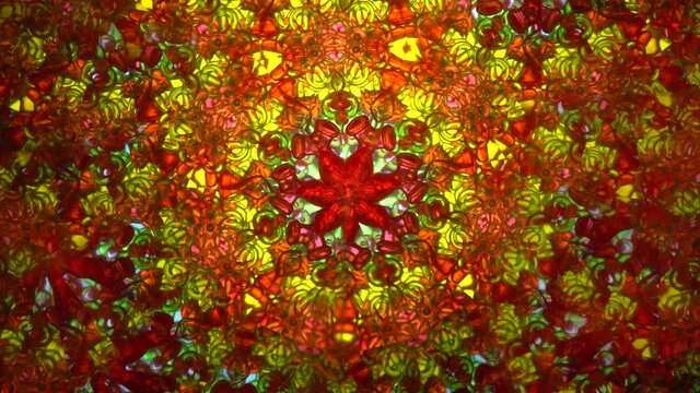 Real kaleidoscope with abstract background. View in colored fractals.