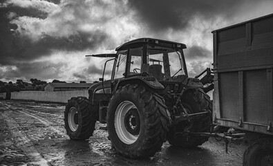 Modern farm tractor in the field prepared for work on the farm. Organic fruit production and orchards