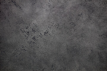 Designed dark stucco background (plastered wall texture).