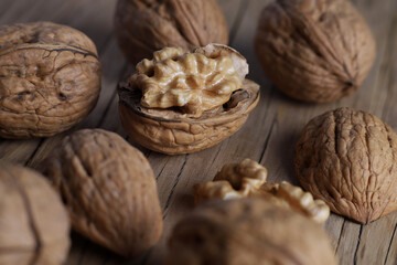 nuts in a textured shell on a vintage table background