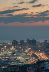 Port of Genoa seen from above at night