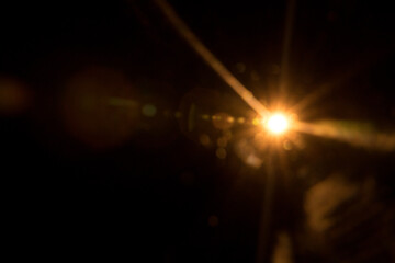 Fototapeta premium Abstract Natural Sun flare on the black